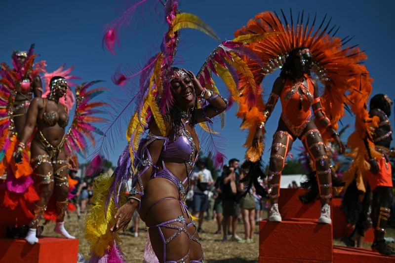 Performers from the Notting Hill Carnival dance on Day 2 of the Glastonbury festival