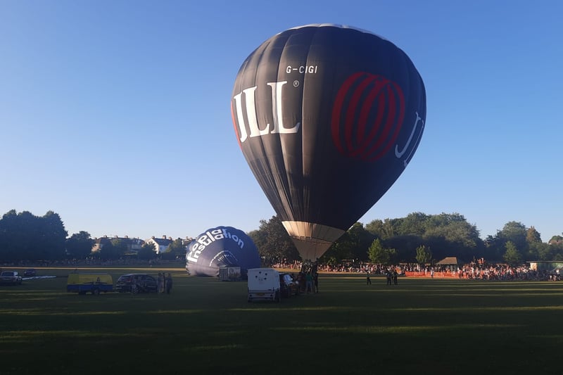 Property consultancy company JLL and Popular Insulation were among the names to feature on the huge balloons going up in the sky (Photo credit: Chris Ward)