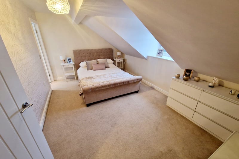 The master bedroom has its own private ensuite and vaulted ceilings. Photo: Zoopla