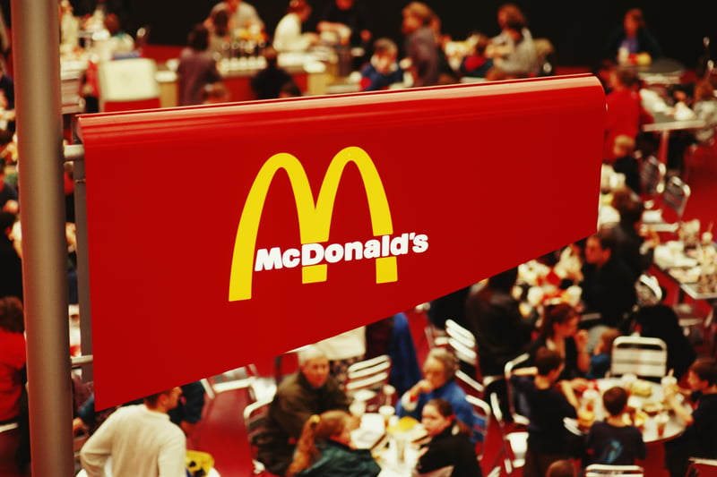 The BSE crisis passed, and the late ‘90s saw the country preparing for a new millenium. Pictured here is a sign for McDonald’s inside the Millenium Dome in  Greenwich - now the O2. (Photo by Steve Eason/Hulton Archive/Getty Images)