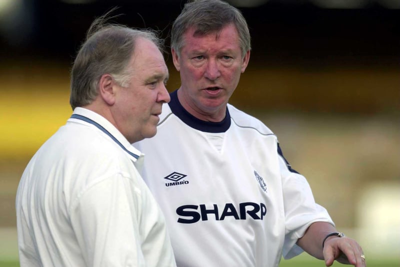 Manchester United boss Sir Alex Ferguson chats with Craig Brown during training at the Maracana Stadium in Rio de Janeiro in January 2000.
