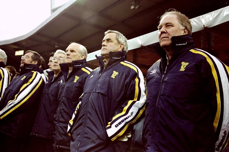 Brown and his coaching staff look on as the national anthem is played ahead of an international match against Germany at the Weserstadion in Bremen in April 1999. Don Hutchison was the toast of the Tartan Army after his stunning second half strike clinched a memorable win.