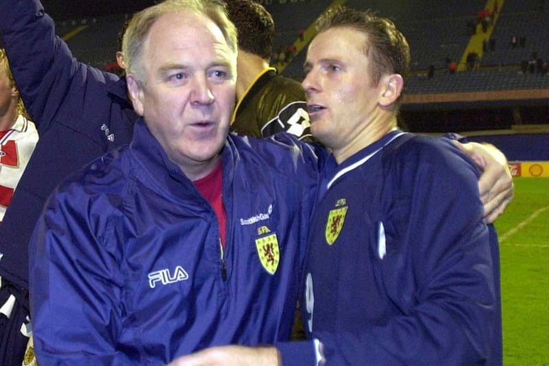 Brown congratulates goal scorer Kevin Gallacher after the  1-1 World Cup qualifying draw against Croatia in Zagreb in October 2000.