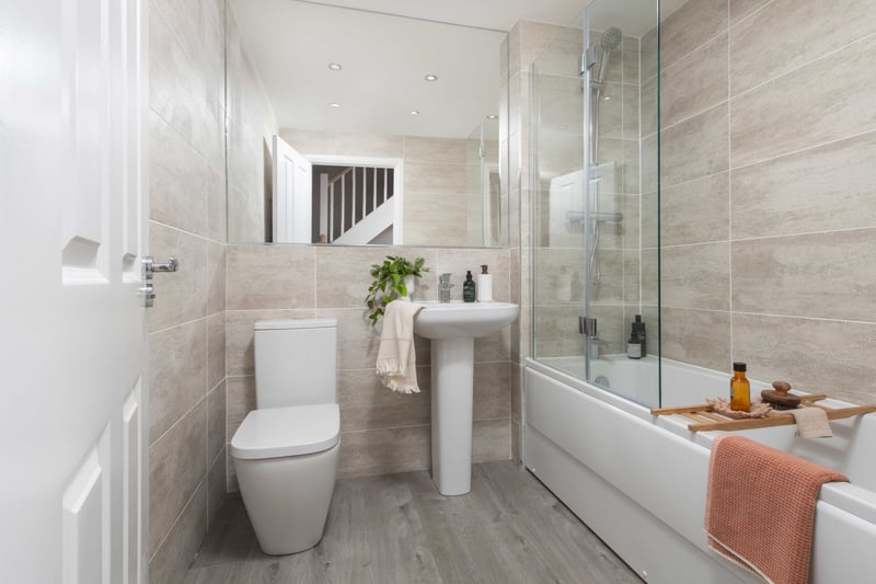The bathroom with a shower and bathtub. Photo by David Wilson Homes