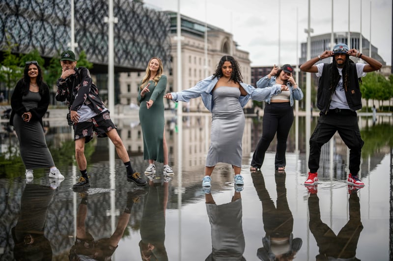 Members of the 93:00 Collective, pose for the media in Centenary Square’s fountains after performing at the launch for the Birmingham Festival 23 on June 28, 2023 in Birmingham, England. (Photo by Christopher Furlong/Getty Images)
