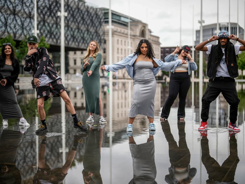Members of the 93:00 Collective, pose for the media in Centenary Square’s fountains after performing at the launch for the Birmingham Festival 23 on June 28, 2023 in Birmingham, England. (Photo by Christopher Furlong/Getty Images)