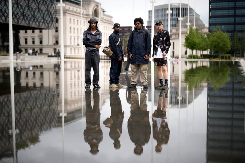 Members of the UPG dance collective and Tarju Le’Sano, right, director of the 93:00 Collective, pose for the media in Centenary Square after performing at the launch for the Birmingham Festival 23 on June 28, 2023. (Photo by Christopher Furlong/Getty Images)