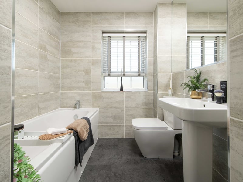 The stylish family bathroom is on the first floor. Photo by David Wilson Homes