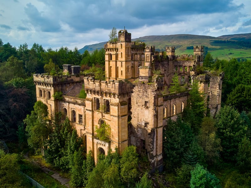 The Scots Baronial mansion is now abandoned nearby Lennoxtown in a site that overlooks the Campsie Fells and Clachan of Campsie. It was built between 1837 and 1841 by David Hamilton for John Lennox Kincaid on the Lennox of Woodhead Estate. However, by 1927 the property was purchased by the Glasgow Corporation who turned it into a hospital for people with learning disabilities which opened in 1936.