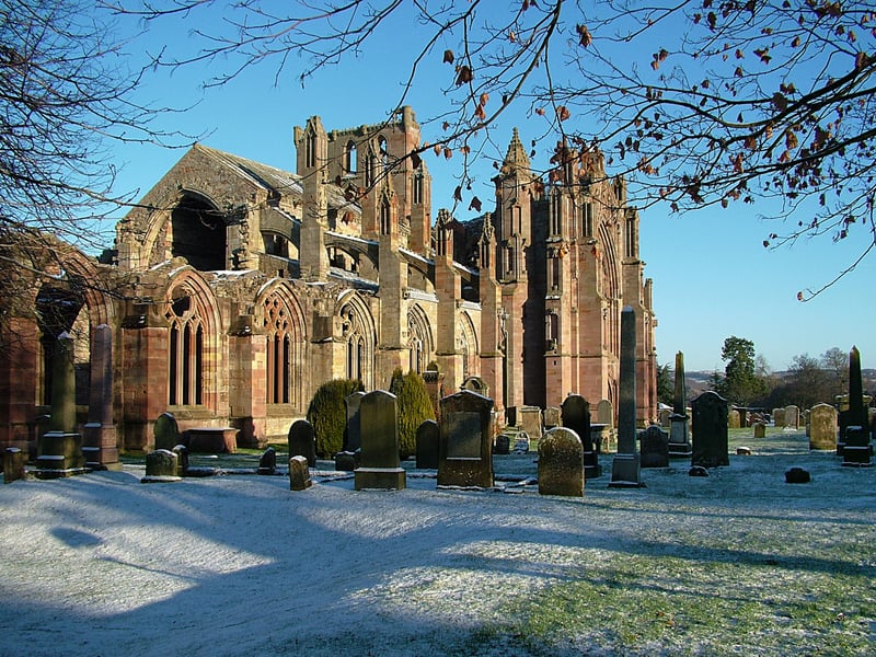 Founded in 1136 by David I, this stunning rosy-hued abbey has inspired art and spiritual devotion for centuries. It was the first Cistercian Abbey in Scotland, located along the River Tweed in the Scottish Borders. The location is particularly well-known for acting as the final resting place of the heart of Robert the Bruce.