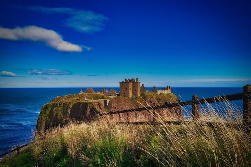 Dunnottar Castle sits atop a rocky outcrop along the Aberdeenshire Coastal Trail; 20 miles from Aberdeen and a mere 1.6 miles south of Stonehaven. The surviving buildings of the site are said to date largely to the 15th and 16th centuries. The castle is famous for playing an important role in the 18th-century Jacobite risings due to the strategic advantages of the location.