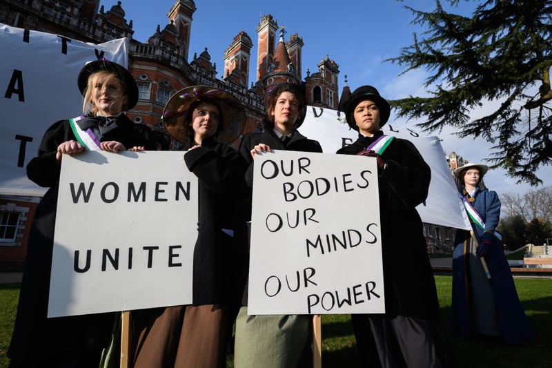 Royal Holloway came 29th. Pictured are students in 2018 re-creating a suffragette protest march.  (Photo by Leon Neal/Getty Images)