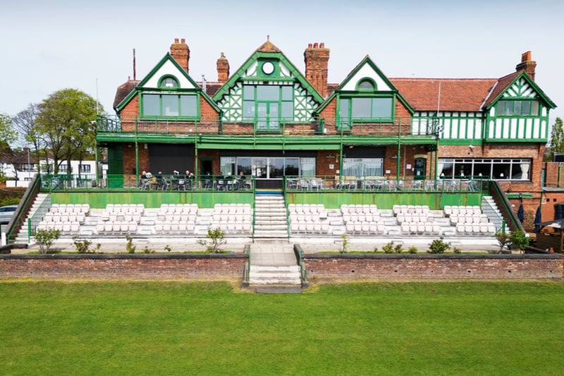 Built in 1880 by renowned architect Thomas Harnett Harrison, the historic cricket pavilion in Aigburth holds the distinction of being the oldest one in the country, that is located at a first-class cricket ground. The Grade II Listed status recognises the pavilion’s special architectural features and its significant place in the history of cricket and sporting events in the North West. Despite several modifications throughout the 20th century, including changes to the balcony, veranda, and tiered terrace, the pavilion has retained its significance and continued to serve as a cherished venue for cricket and other functions.