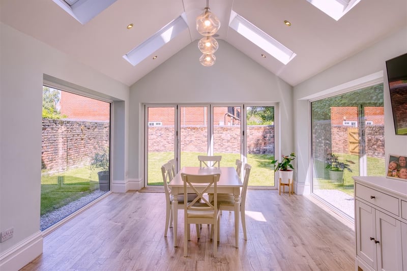 The dining area is surrounded by soothing views of the property’s garden. Imagine enjoying breakfast on a sunny Sunday morning with the family here.