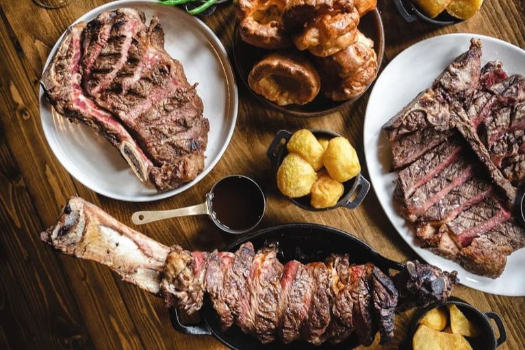 Sharing Sunday roasts - 500g roast rump 35 day dry-aged beef or 1.2kg tomahawk, 45 day dry-aged, homemade Yorkshire pudding,carrots, celeriac, turnip, grilled corn, roast potatoes, green beans, beef dripping gravy