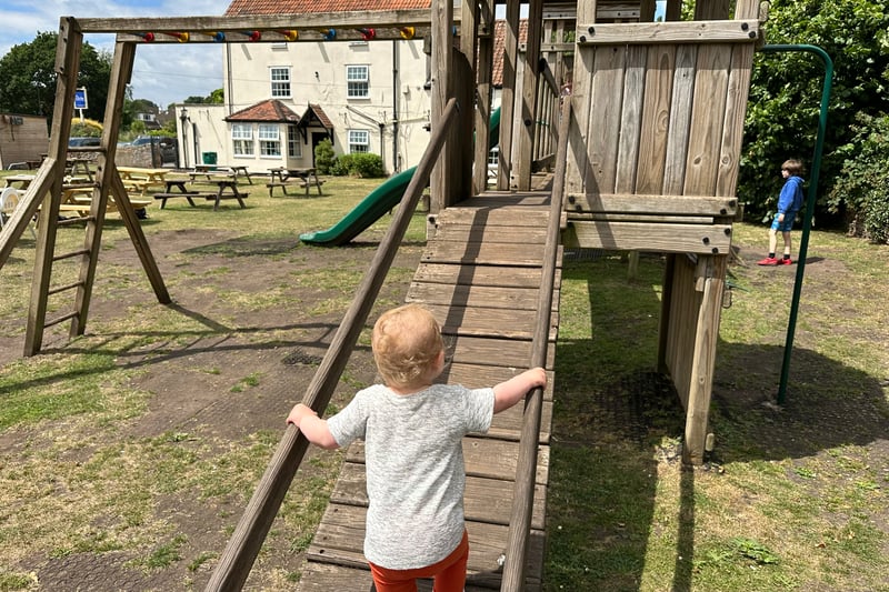On a warm day, the playground in the pub garden at The Globe Inn is the perfect place for the kids to play while watching parents can enjoy a drink.