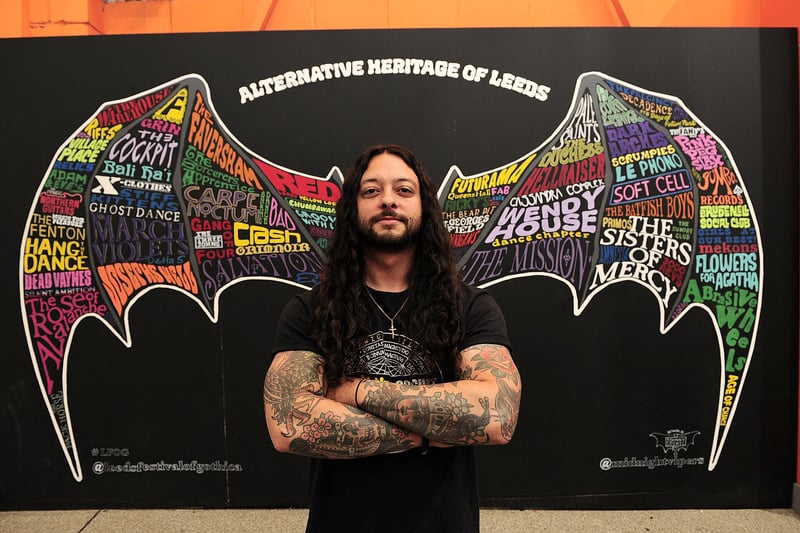 Johnny Cosmic, who designed the  Alternative Heritage of Leeds mural on display at Leeds Market.