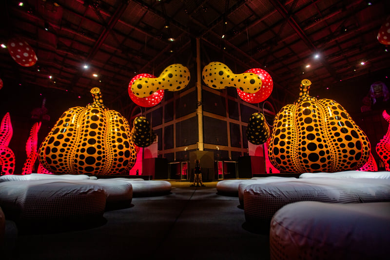 Kusama is renowned and adored for her surreal world of dots and pumpkins amongst other artistic motifs.