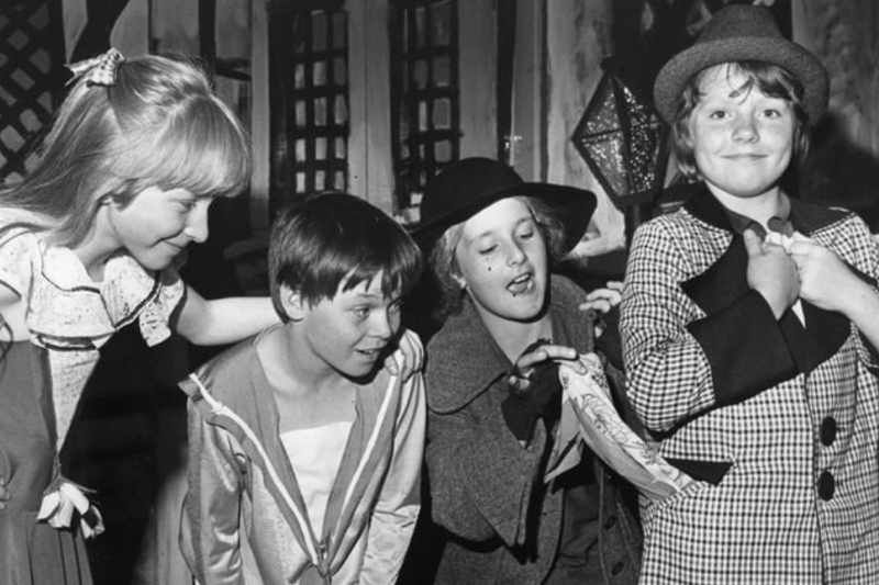 A lovely scene at St James RC Primary School in 1981. Fagan (played by Maura Connelly), teaches Oliver (Calum Samuels) the tricks of the trade, picking the pocket of the Artful Dodger (Anne Duffy), watched by Nancy, (Vickie Phelan). Photo: Shields Gazette