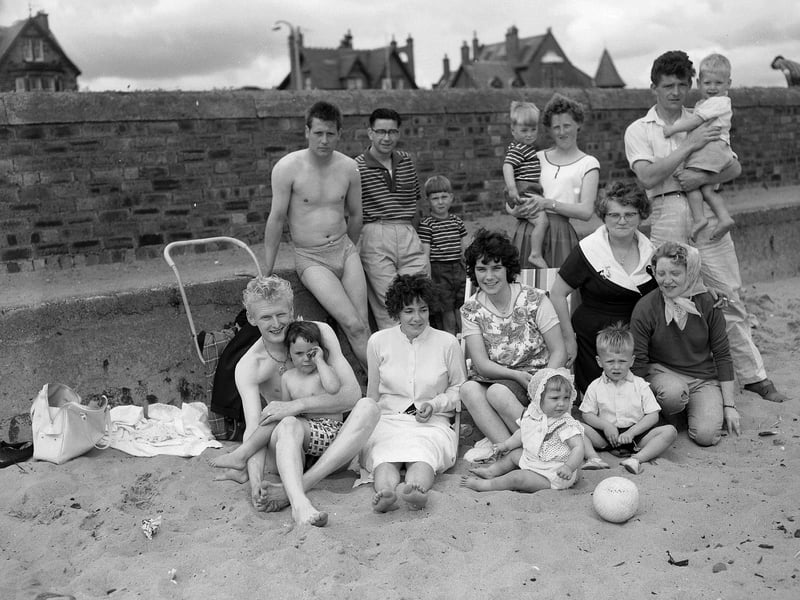 Tourists on the beach at Leven, in  Fife, in July 1961.