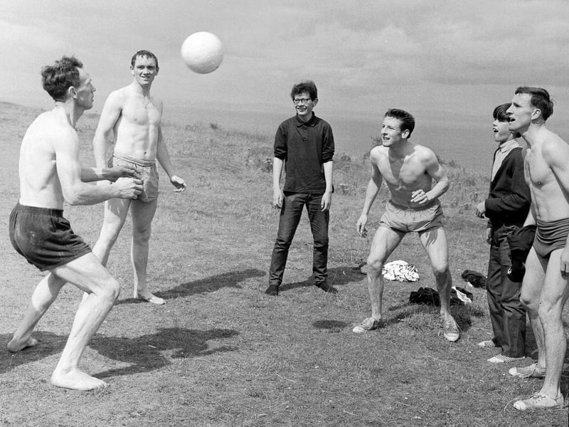 Members of Hearts football team during a training day at Gullane Beach. in East Lothian, in August 1965. Some local boys joined them for a game of keepie-uppie.