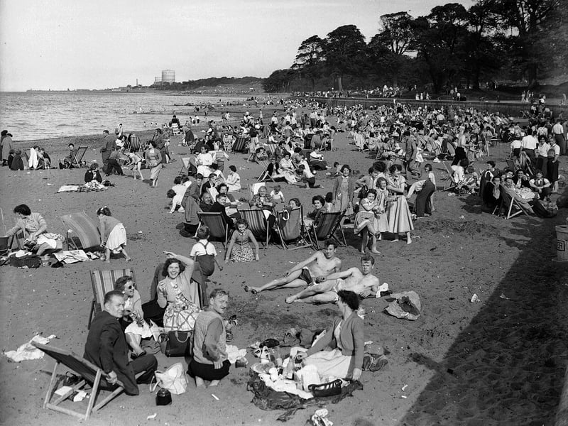 Holidaymakers at Cramond beach, in Edinburgh, in July 1955.