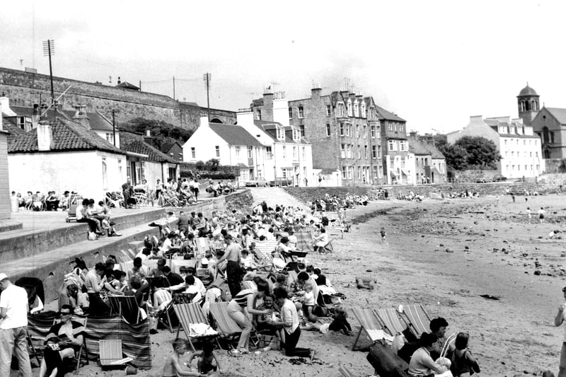 Holidaymakers on the beach at Kinghorn, in Fife, in July 1966.