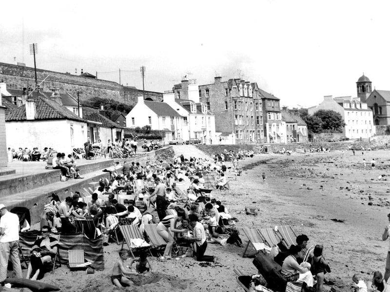 Holidaymakers on the beach at Kinghorn, in Fife, in July 1966.