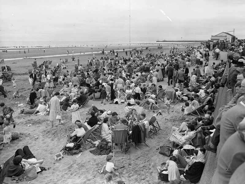 Visitors from Glasgow cram onto Ayr Beach in July 1955.