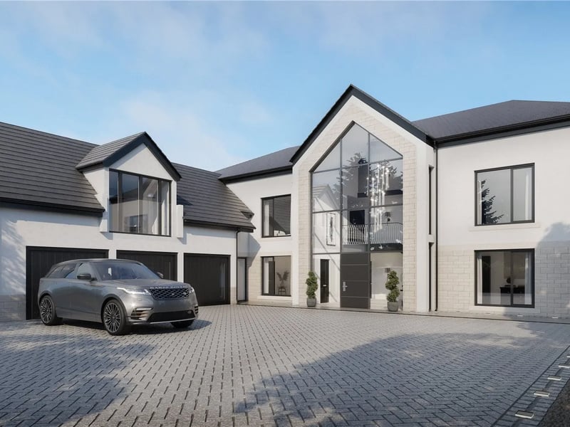This six bedroom and seven bathrooms property on one of North Leeds' most sought-after lanes, Wigton Lane in Alwoodley, is one of the most expensive properties currently on the market.
It features a grand reception hall with porcelain tiled flooring and a bespoke sweeping staircase and decorative Helical balustrade, which showcases the house's luxury right away upon entering.