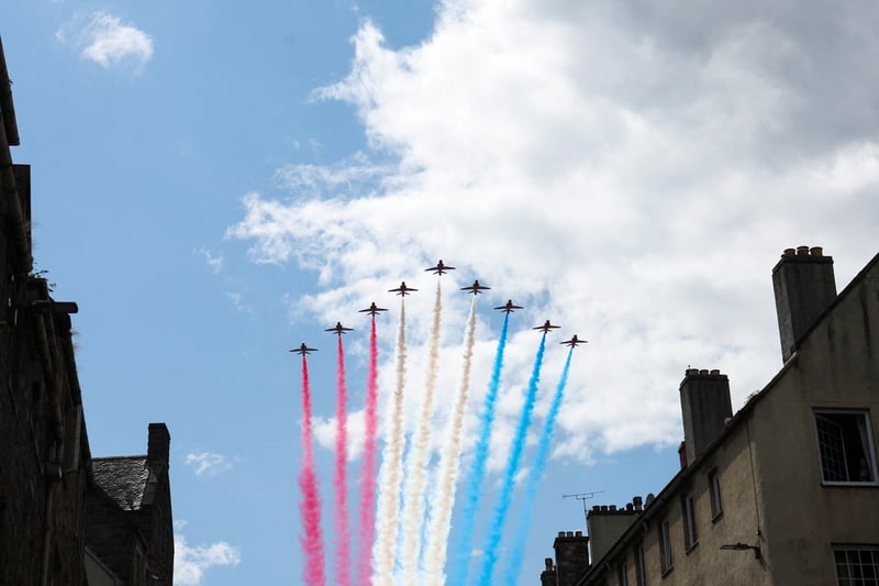To celebrate the service, the Red Arrows fly over the Royal Mile.