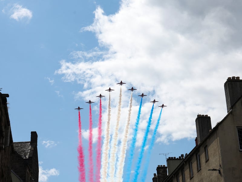 To celebrate the service, the Red Arrows fly over the Royal Mile.