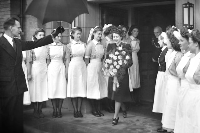 Nurses form a guard of honour for Princess Elizabeth at the Eye Infirmary in 1946.