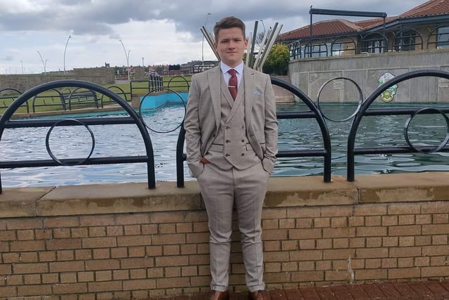 This young chap is sporting a smart suit for his prom night
