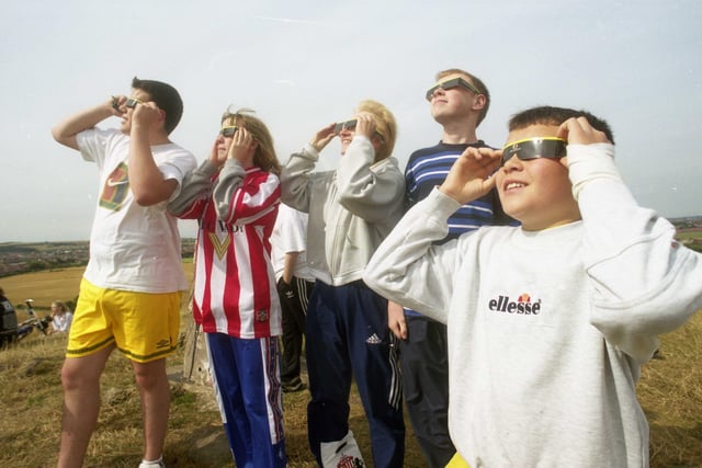 Wearing special viewing glasses to watch the eclipse.
Simon Rossi, Charlotte, Eleanor and Nicholas Farrell and Fernando Rossi in 1999.