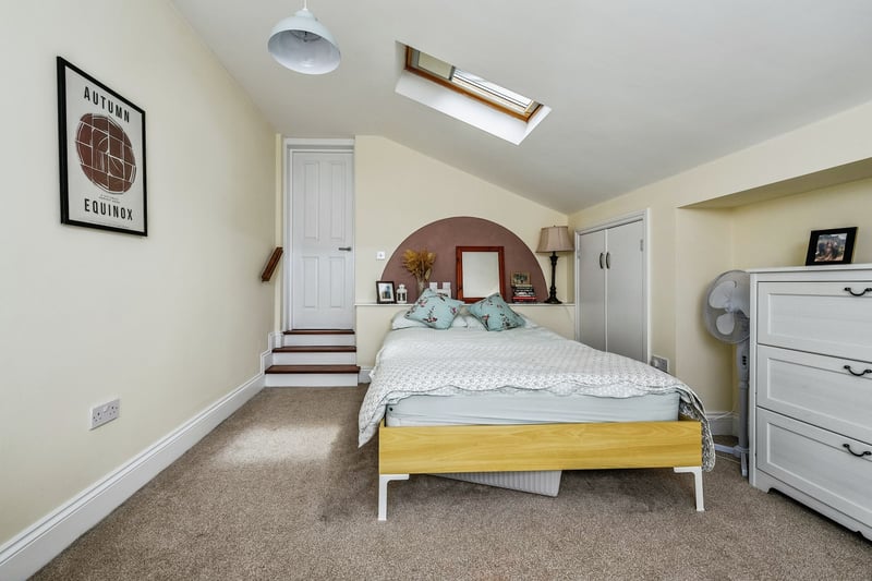 To the second floor you’ll find the fourth bedroom along with two large attic areas.