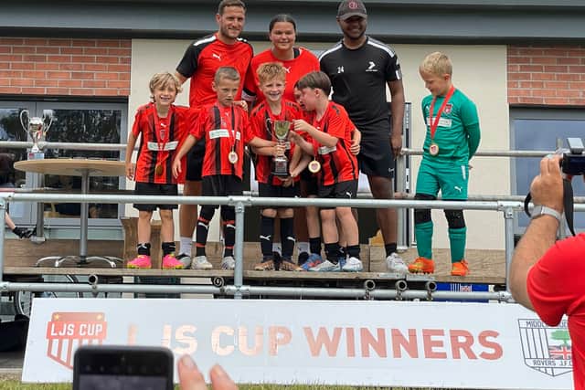 Billy Sharp celebrates with his youngest son’s side after victory at the LJS Cup 
