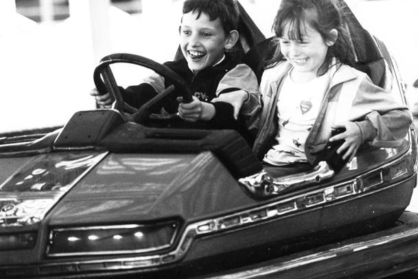 A happy scene as these children enjoy the South Shields fun fair which was opened for the Variety Club of Great Britain in June 1990.