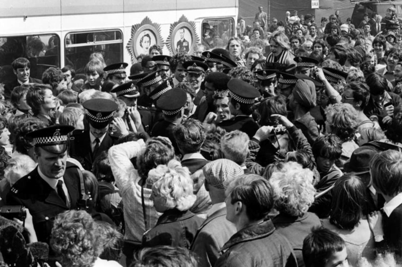 A packed and adoring crowd surrounds the champion. Can you spot someone you know? Photo: Photo: Freddie Muddit and thanks to www.southtynesidehistory.co.uk for their help. Photo: Freddie Muddit