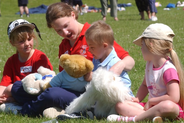 St Robert's School held a picnic for children from feeder schools in 2005 and here is Catherine Morris with youngsters Emma Wilson, Connor Morrison and Victoria Marshall - plus a teddy or three.