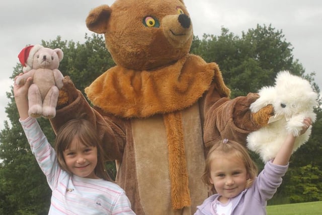 Bethany and Abbi Lewington had a giant teddy for company in their picnic at Princess Anne Park in Washington 19 years ago.