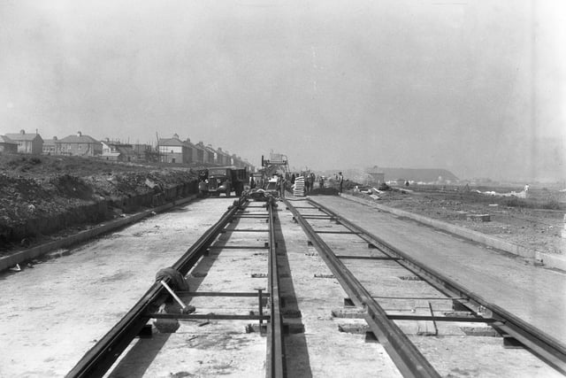A busy scene as workmen continue the construction programme on Dykelands Road in 1936.