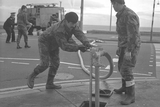 A ''dummy run'' for these firefighting soldiers from their base at the Dykelands Road drill hall to the nearby seafront in 1977.