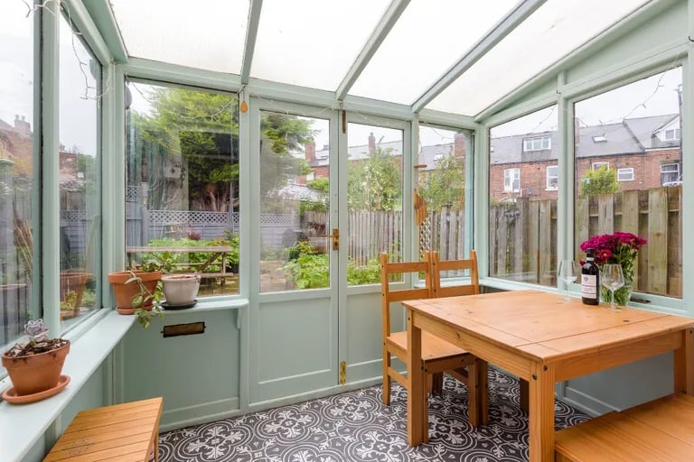 This conservatory extension offers a lovely place to enjoy a bit of the outdoors from the comfort of your home.