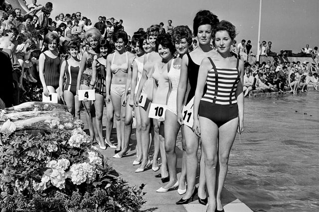 Contestants in the 1964 Miss Dunbar beauty pageant pose beside Dunbar Lido.