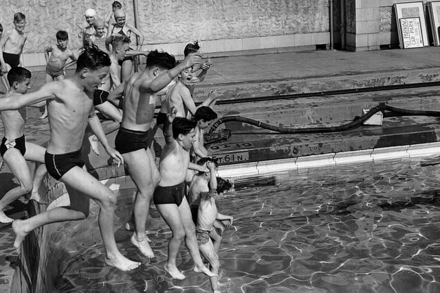 Jumping in at the deep end at Portobello Outdoor Swimming Pool in 1952.