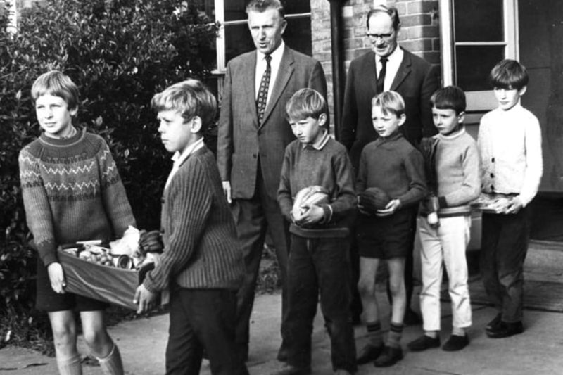 Pupils of Horsley Hill Junior Boys School with harvest festival produce. Pictured with the pupils is headmaster Thomas Keir (left) and Mr Harry Chalk. Photo: Shields Gazette