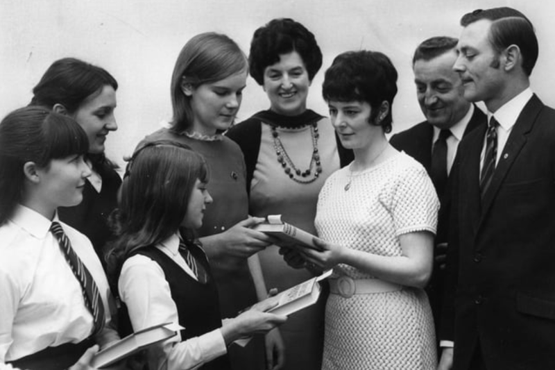 Mrs R Hunter, presents the head girl of Westoe County Secondary Girls' School, Denise Maughan, with her award at speech day. Left to right are: Susan Gates, Alyson Young, Alison Tait, headmistress; Ina Keir, Councillor G H Forster, vice chairman of the school governors and Councillor Hunter. Photo: Shields Gazette