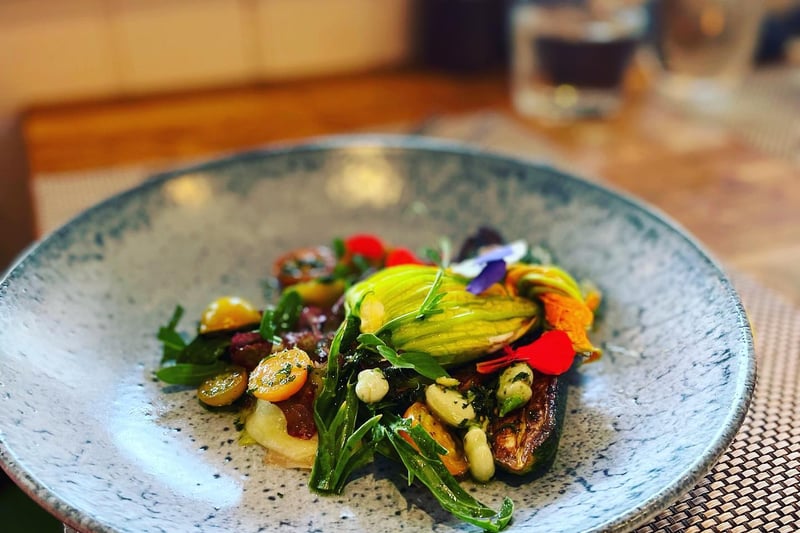 Drum roll please. Dory Garden Starter, courgette flower stuffed with mozzarella, herbs & sunflower seeds, served with pan fried courgette’s, Dory tomatoes & broad beans.