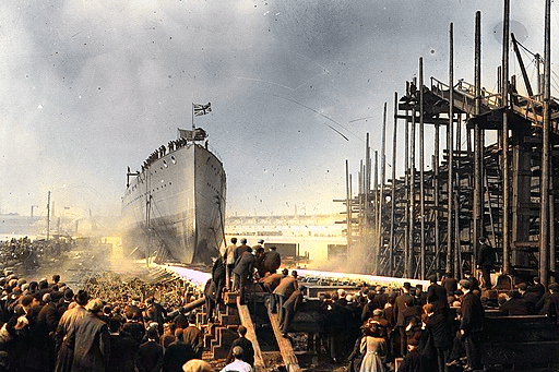 The launching of the British ship ‘Indomitable’ at Glasgow dockyards, on the Clyde. Many great ships and Cunard liners were built in the shipyards on the Clyde including the ‘Aquitania’ and the ‘Queen Mary’. 